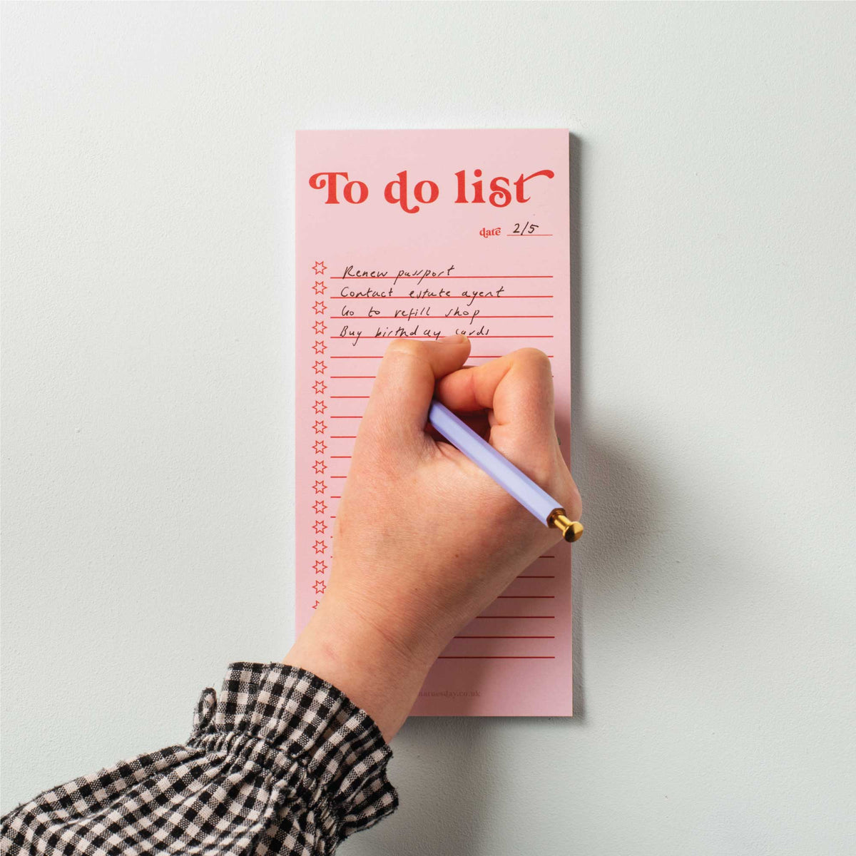 Slim pink and red notepad with belly band