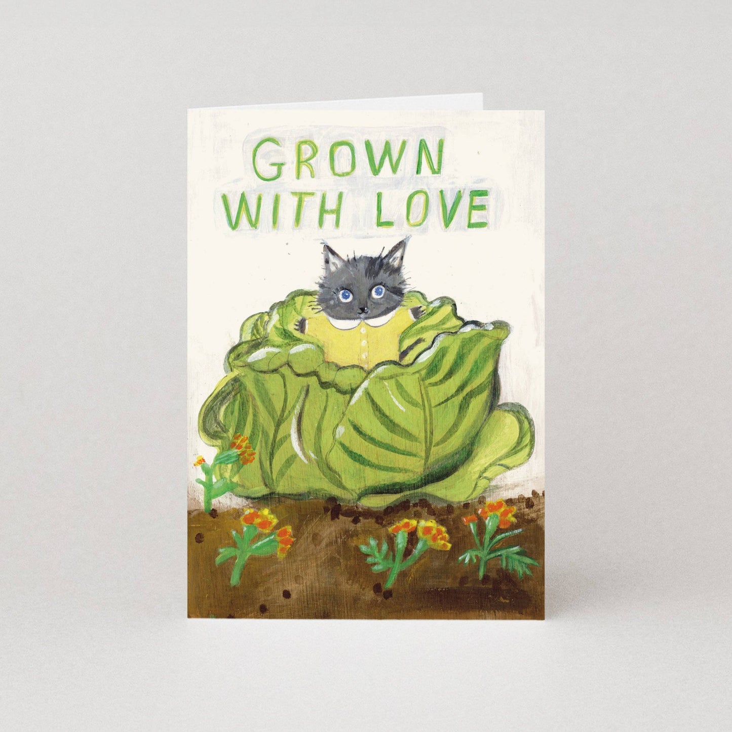 Cabbage New Baby Greeting Card featuring a cute kitten inside a green cabbage