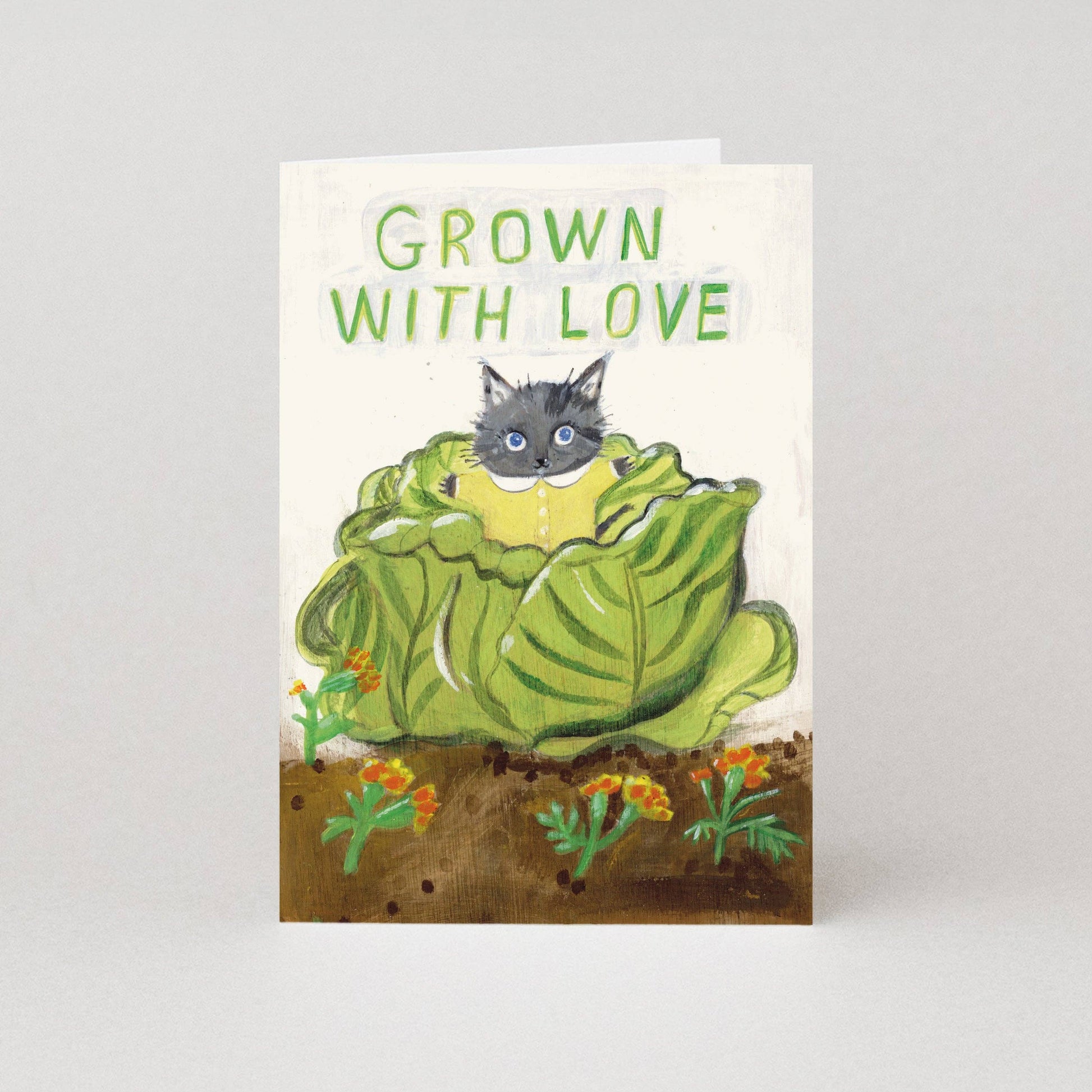 Cabbage New Baby Greeting Card featuring a cute kitten inside a green cabbage