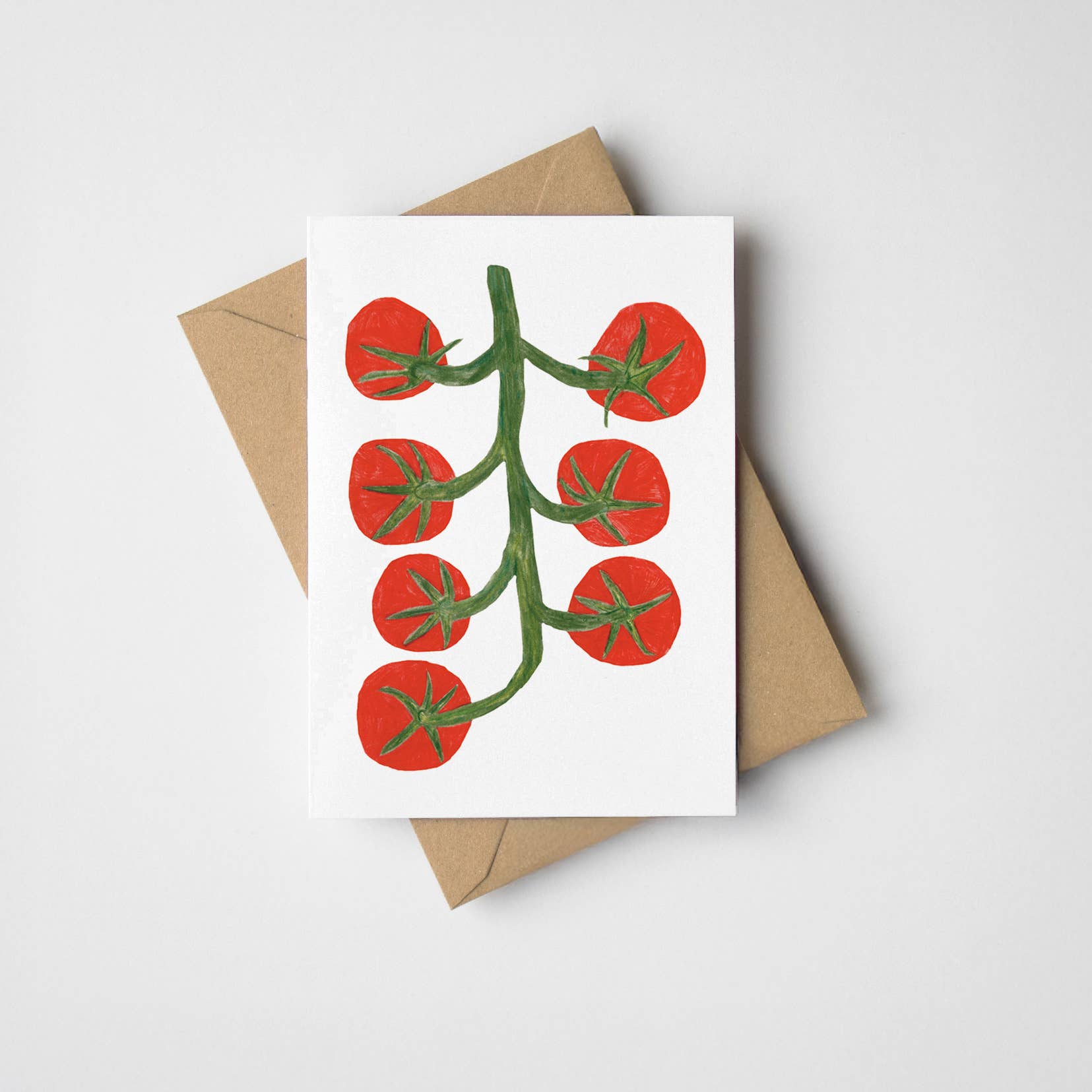 A mini card featuring an illustration of tomatoes on a vine.  A7. Comes with a kraft envelope. Printed in the UK.