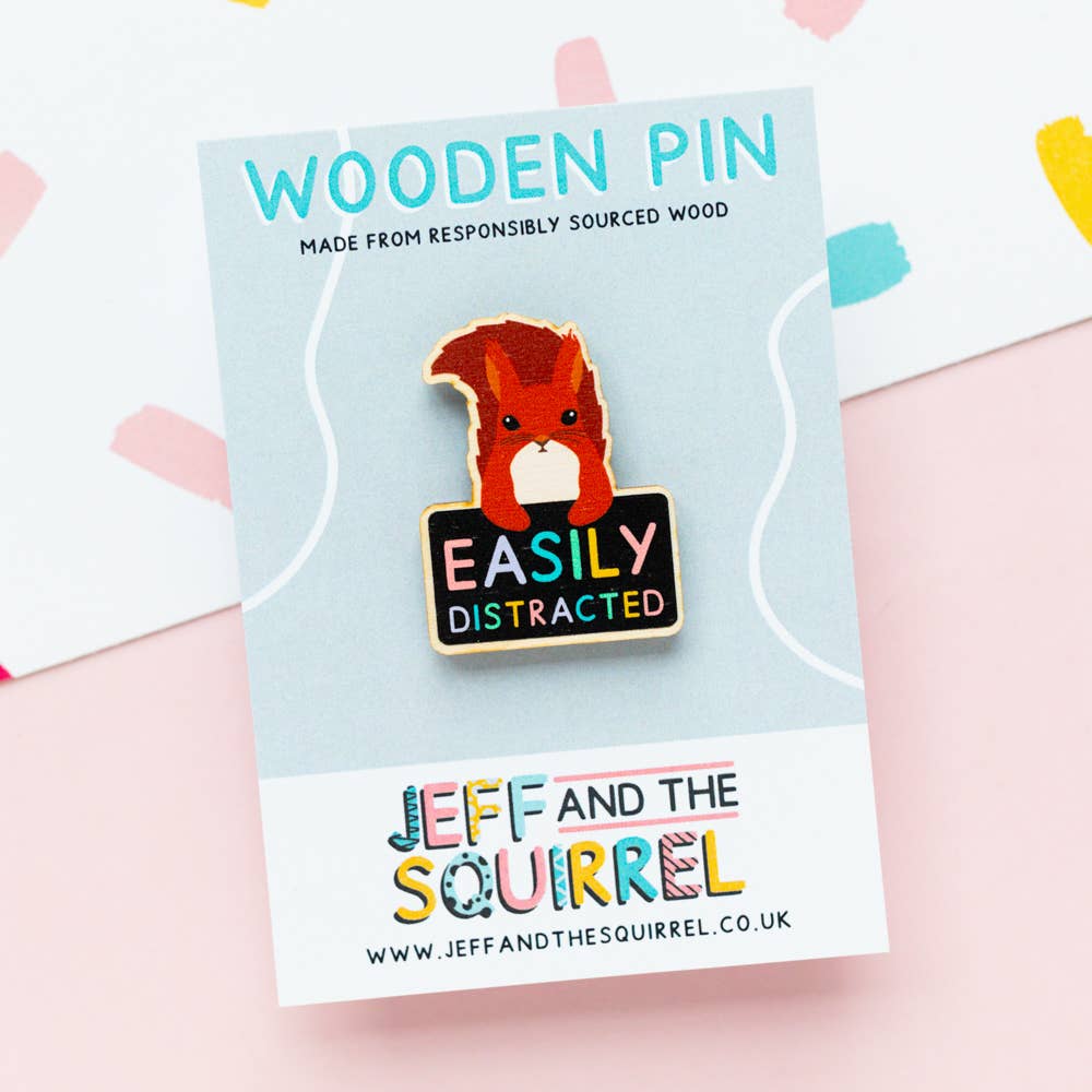 Eco-friendly ADHD squirrel wooden badge on recycled backing card