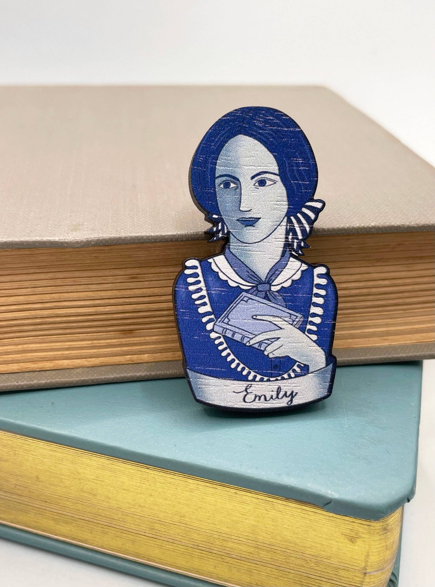 Detail view of Emily Bronte wooden brooch engraving