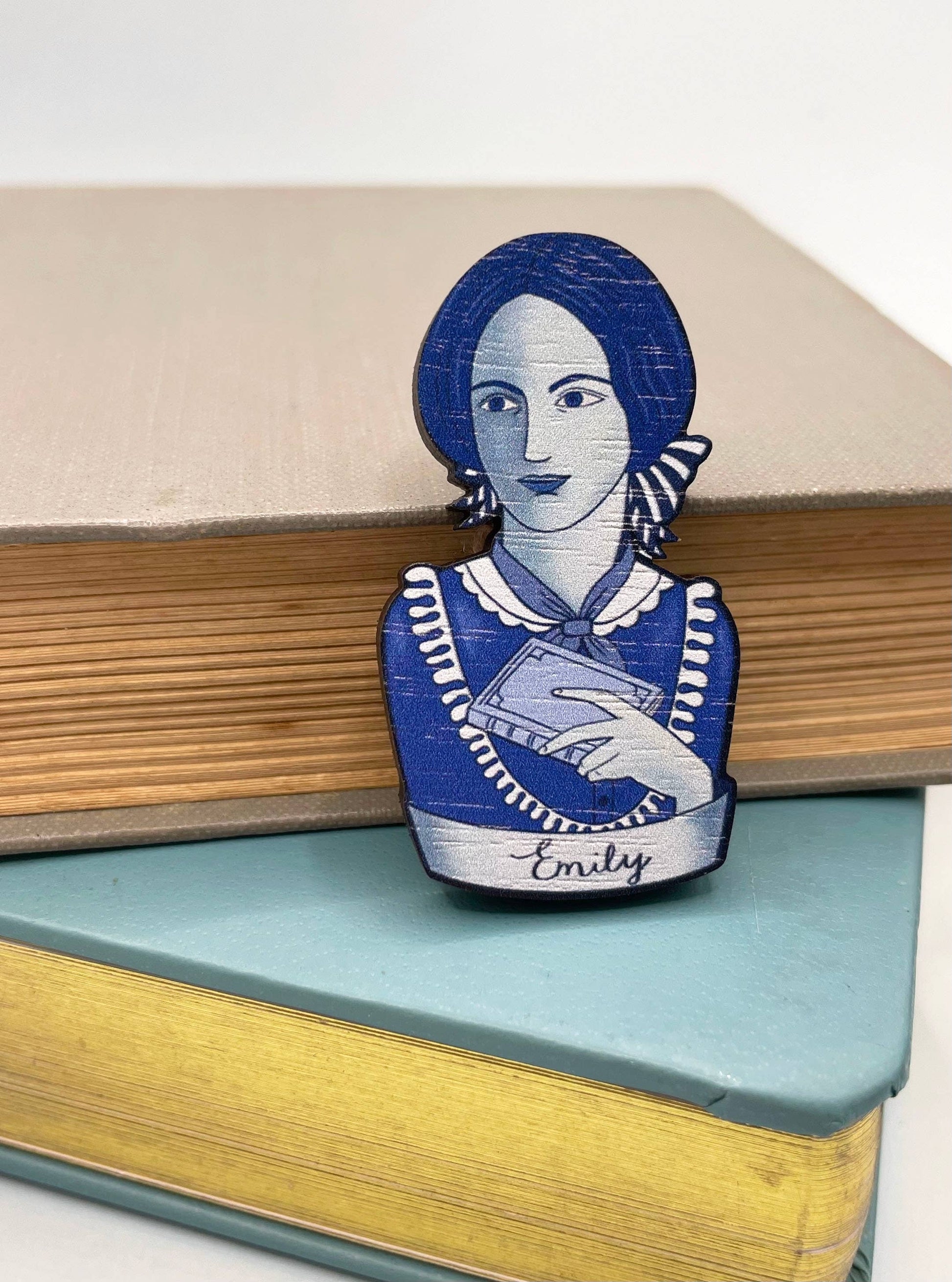 Detail view of Emily Bronte wooden brooch engraving