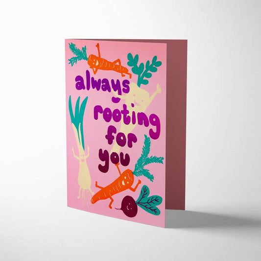 Joyful Rooting For You greeting card by 1973, colourful root vegetable illustration, gold foil detail, pink board, orange envelope, size 108mm x 140mm.