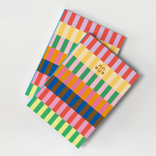 Bold Stripe Tube Pattern notebook in vibrant colours, premium lined pages, ribbon marker, and eco-friendly materials.