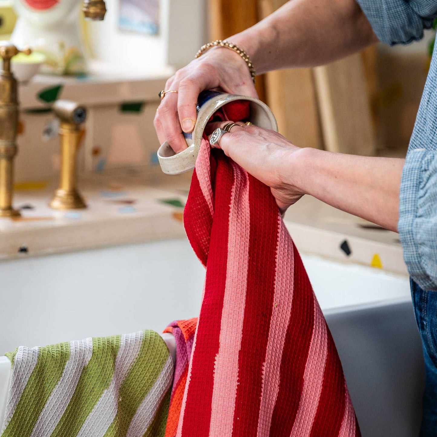Sustainably made crimson waffle cotton tea towel folded