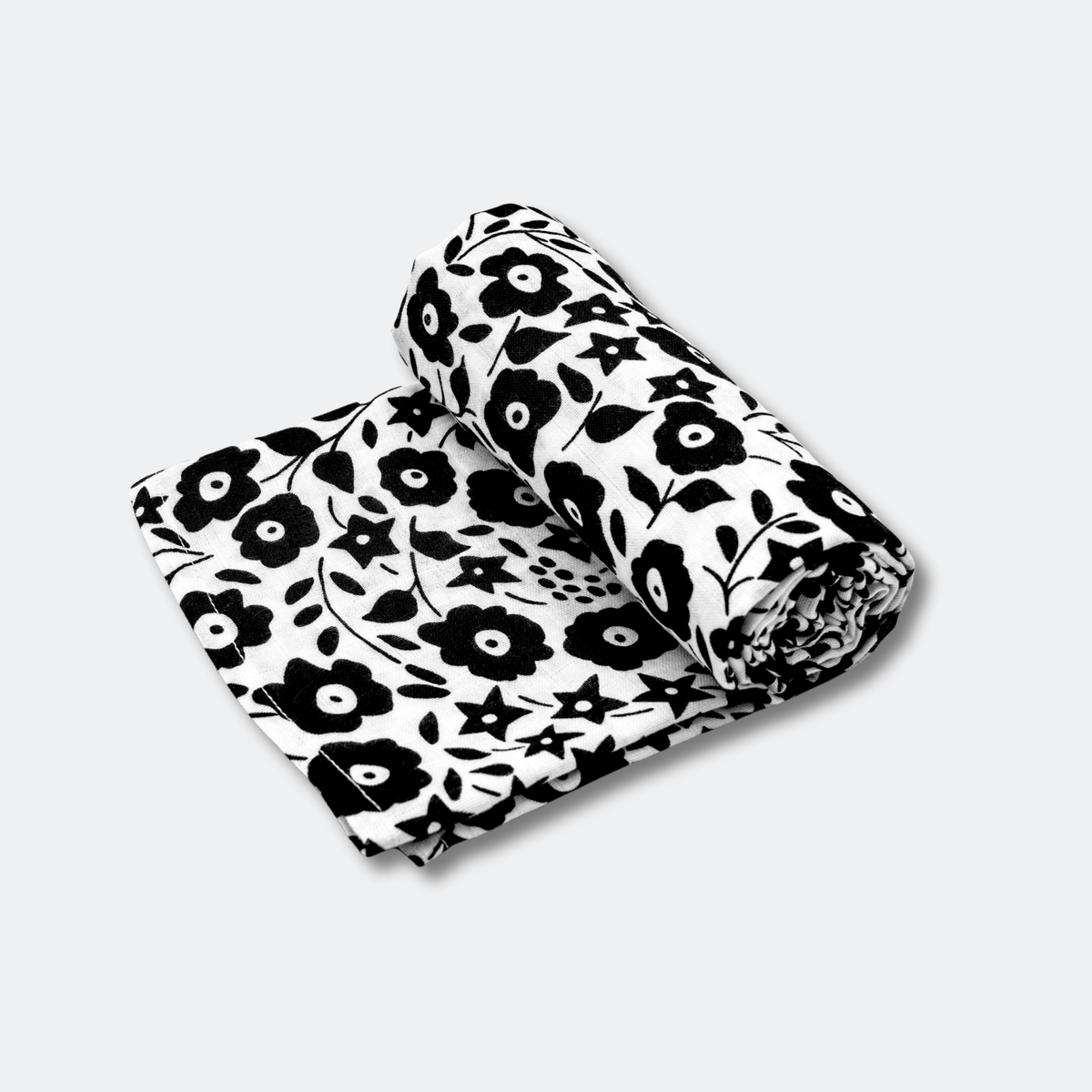 Extra large sensory muslin laid out as a playmat