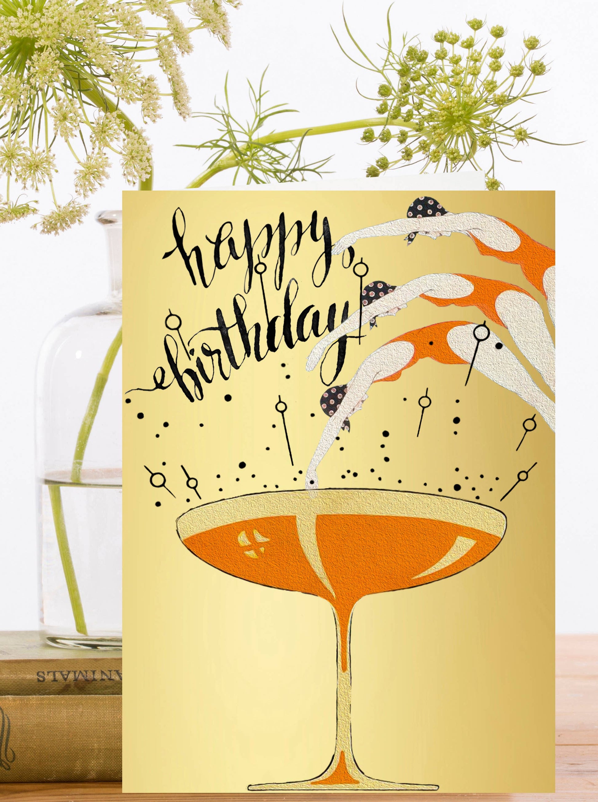 Art Deco Gold Foil Birthday Card with ladies diving into champagne coupe, ivory envelope