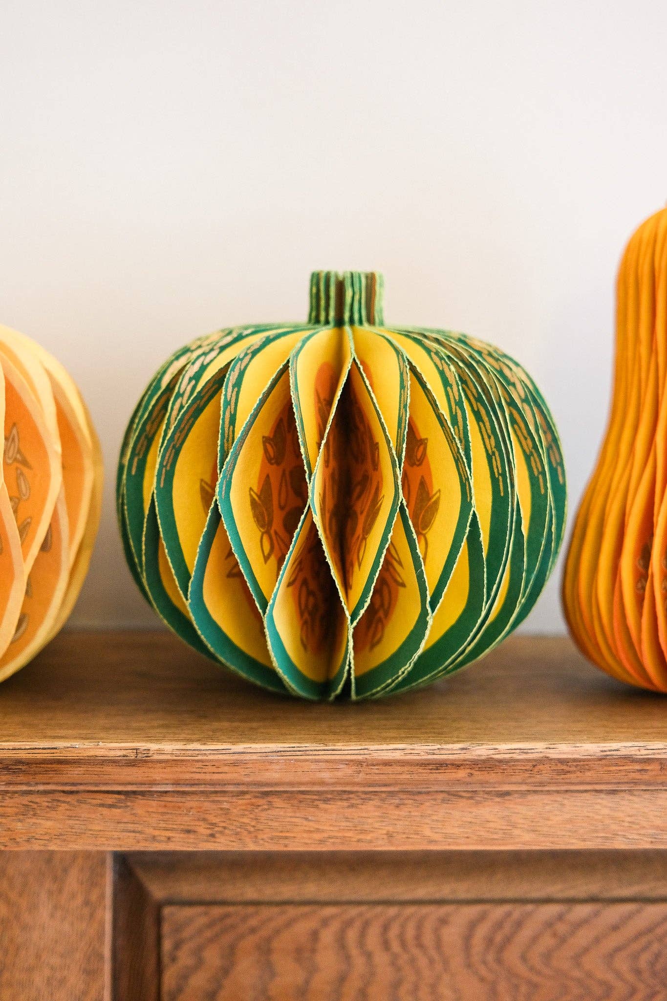Recycled cotton paper gourd honeycomb decoration with cotton hanging loop, eco-friendly ornament.