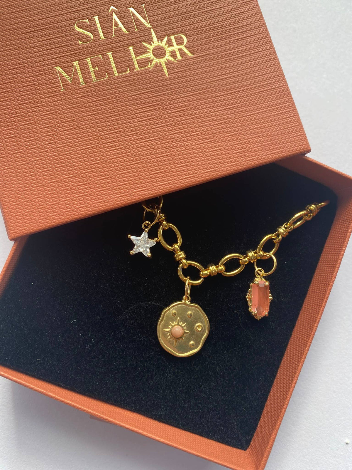Celestial disk multi charm necklace in 18k gold plated stainless steel