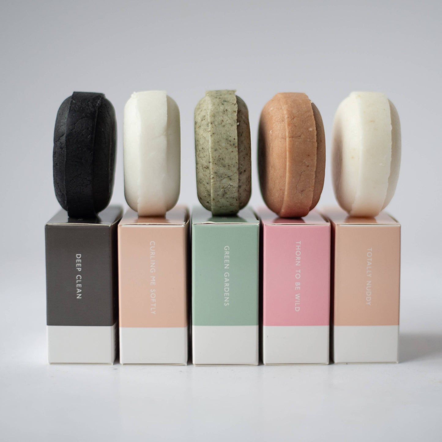 Plastic-free shampoo bar with plant-based ingredients for hair nourishment.