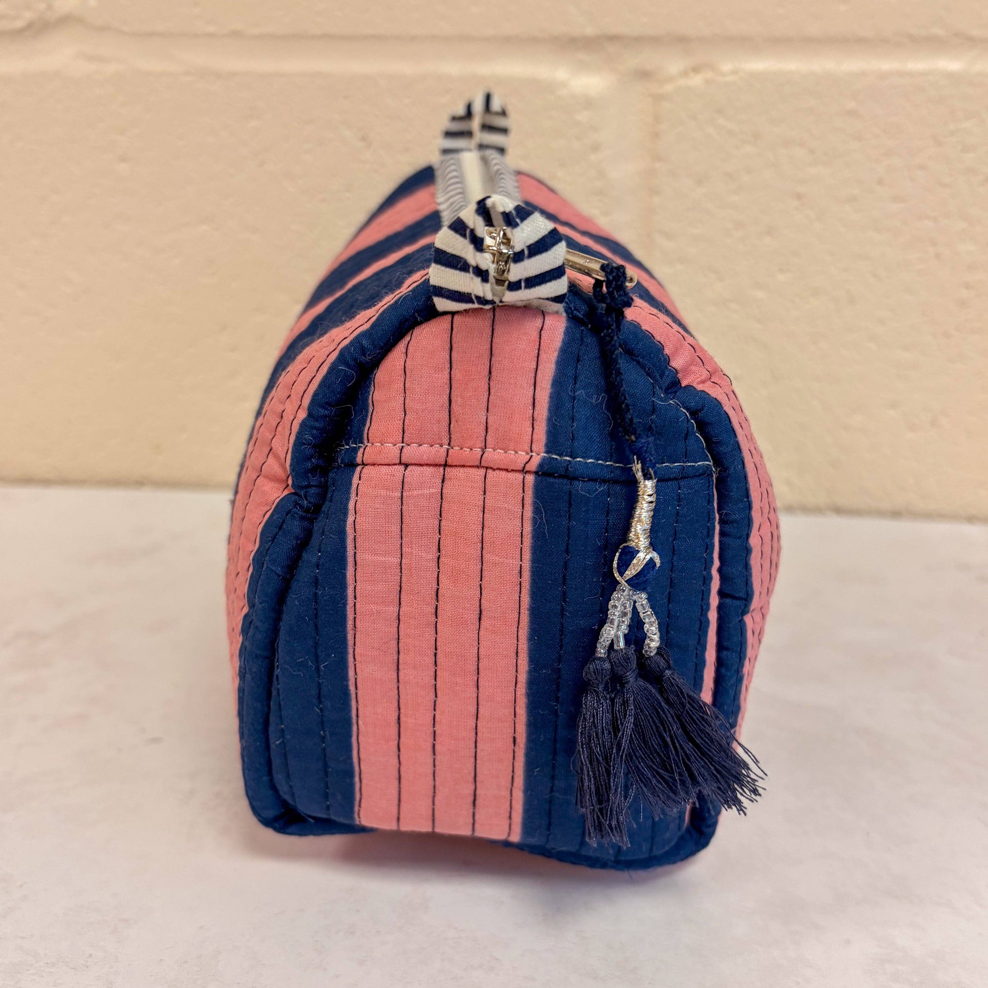 Large pink and navy stripe cosmetic bag with Constance & Denny label