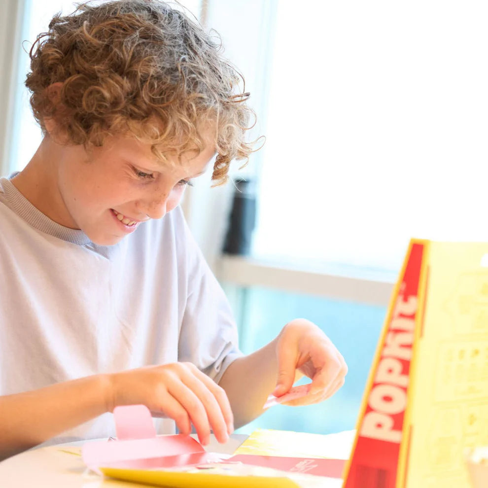 Llama Popkit Design Studio box open, showing the various components for creative play.