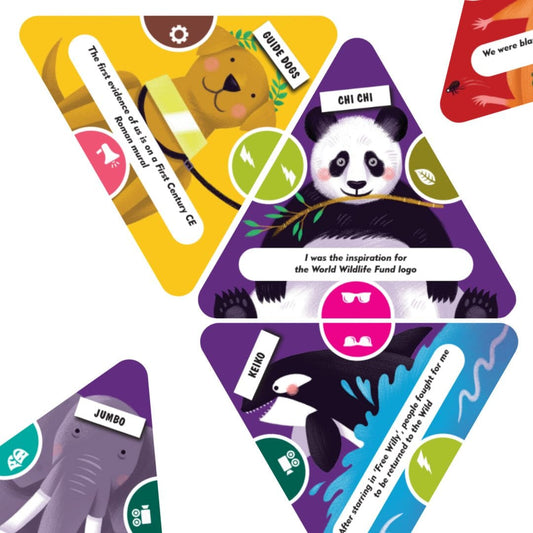 Triangular animal hero cards from A Little Slice of Animal History laid out on a table