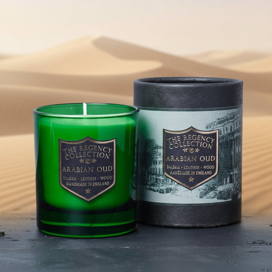 Arabian Oud Scented Soy Wax Candle in elegant green glass by Parkminster. Features rich notes of Balsam, Leather, and Wood. Handmade in Cornwall, UK.