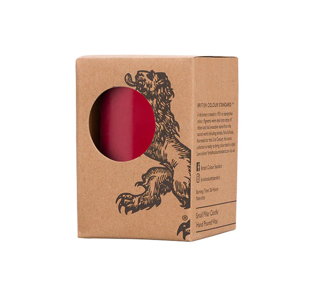 An eco, fair trade pillar candle, hand poured in British Colour Standard Guardsman Red.