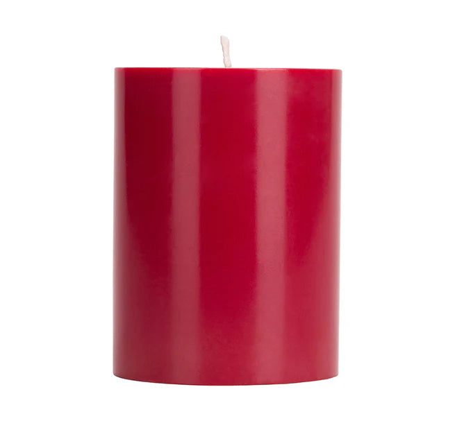 An eco, fair trade pillar candle, hand poured in British Colour Standard Guardsman Red.