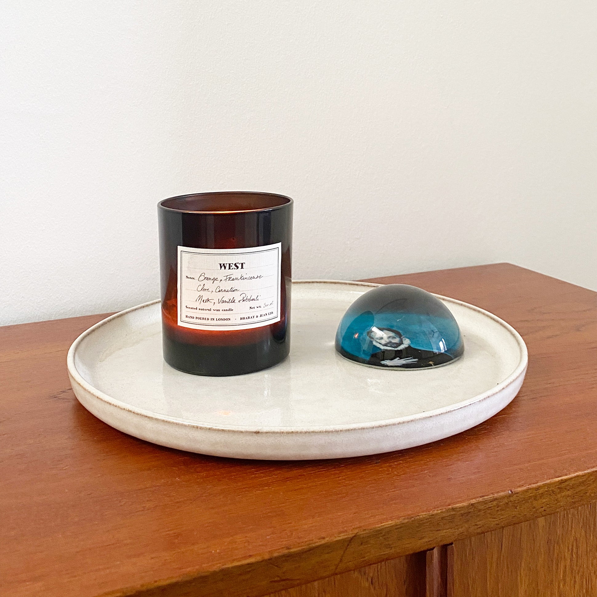 West candle with orange and frankincense notes