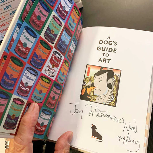 Inside spread of A Dog's Guide to Art book, humorous dog illustration