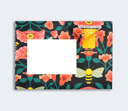 Close-up of a folded Pigeon Letter with intricate floral pattern