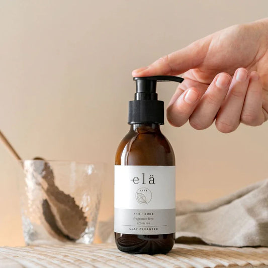 Gentle fragrance-free Green Tea Clay Cleanser applied to skin