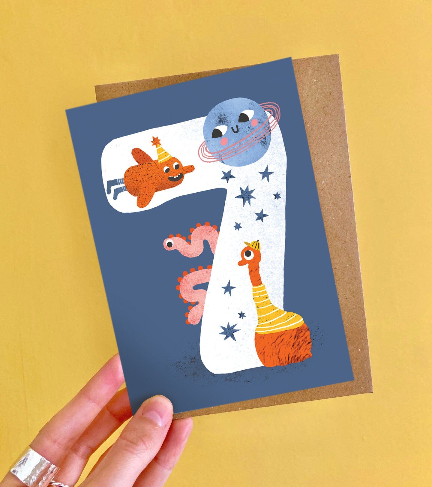 Emily Nash Crazy Critters Age Seven colourful birthday card with recycled kraft envelope, sustainably certified card