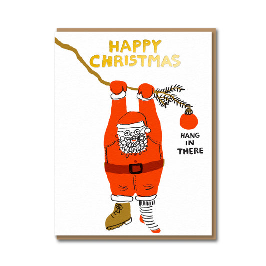 Hang In There Santa Christmas card by Egg Press, Santa hanging from a tree branch, gold foil message, letterpress printed, kraft envelope.