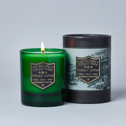 Indian Lotus Scented Candle in green glass vessel with black tubular packaging. Parkminster Regency Collection.