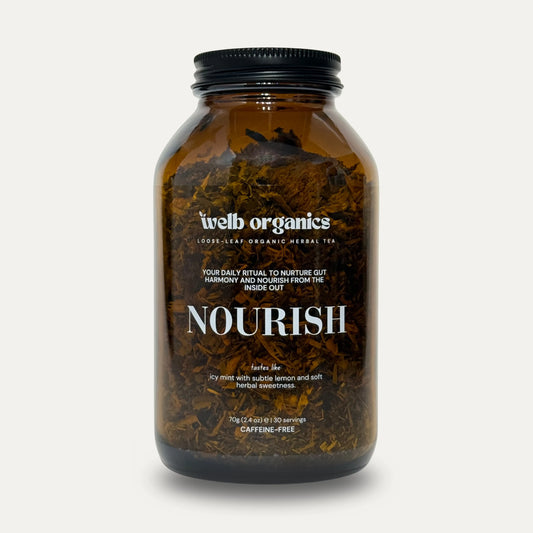 Welb Organic Nourish Tea in signature apothecary glass jar