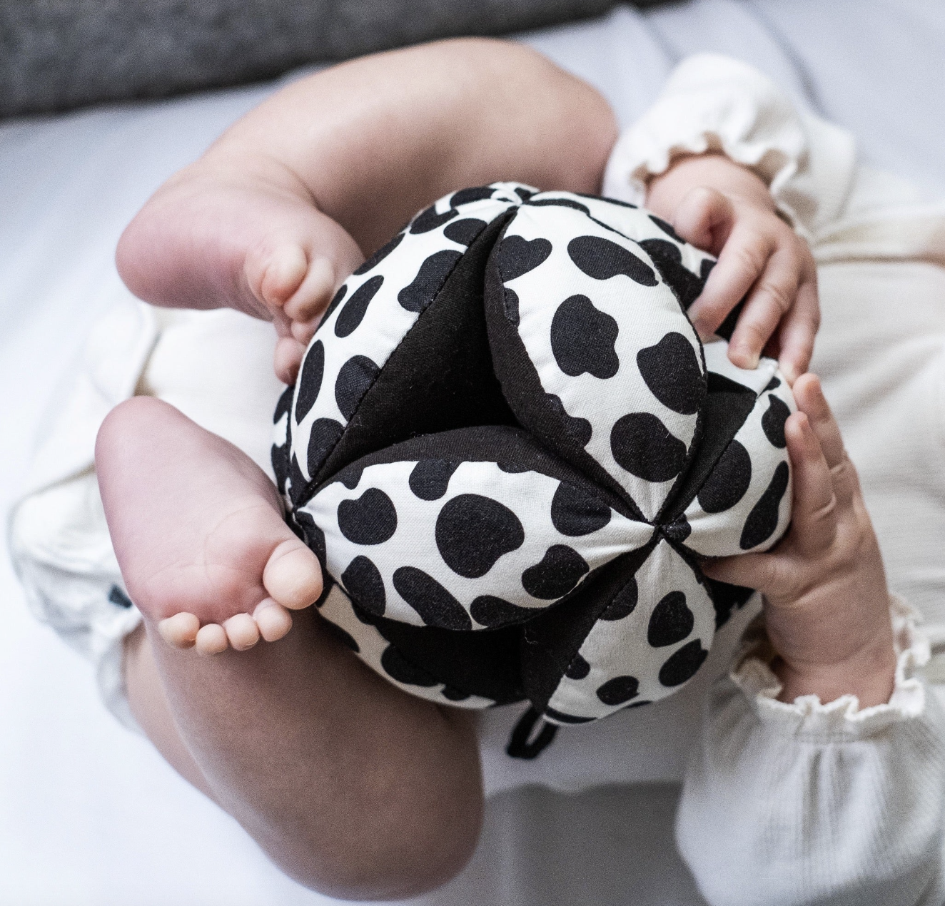 Sensory Grasp Ball. The grasp ball has a perfectly scaled Dalmatian pattern to support your baby's visual development and capture their attention.