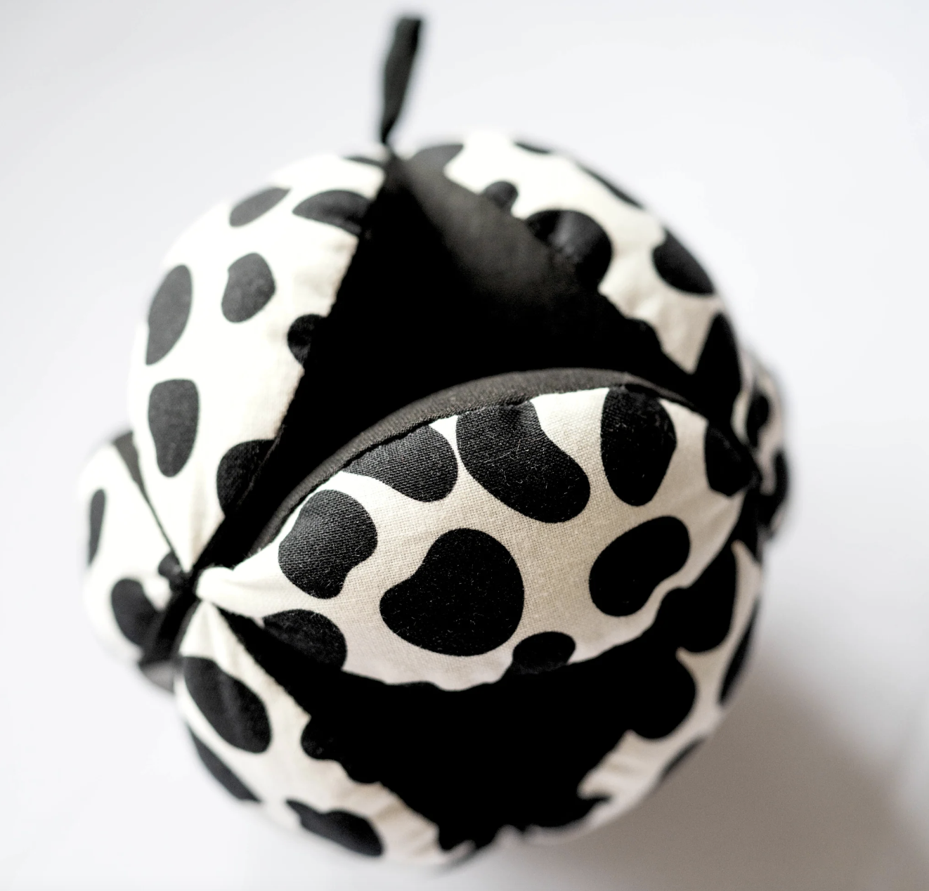 Sensory Grasp Ball. The grasp ball has a perfectly scaled Dalmatian pattern to support your baby's visual development and capture their attention.