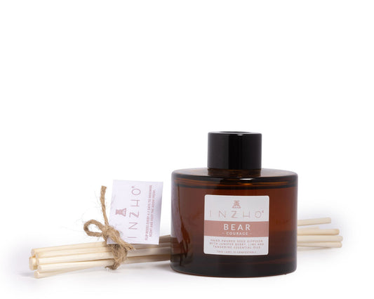 Close-up of Bear Reed Diffuser essential oils and natural reeds, promoting courage and confidence