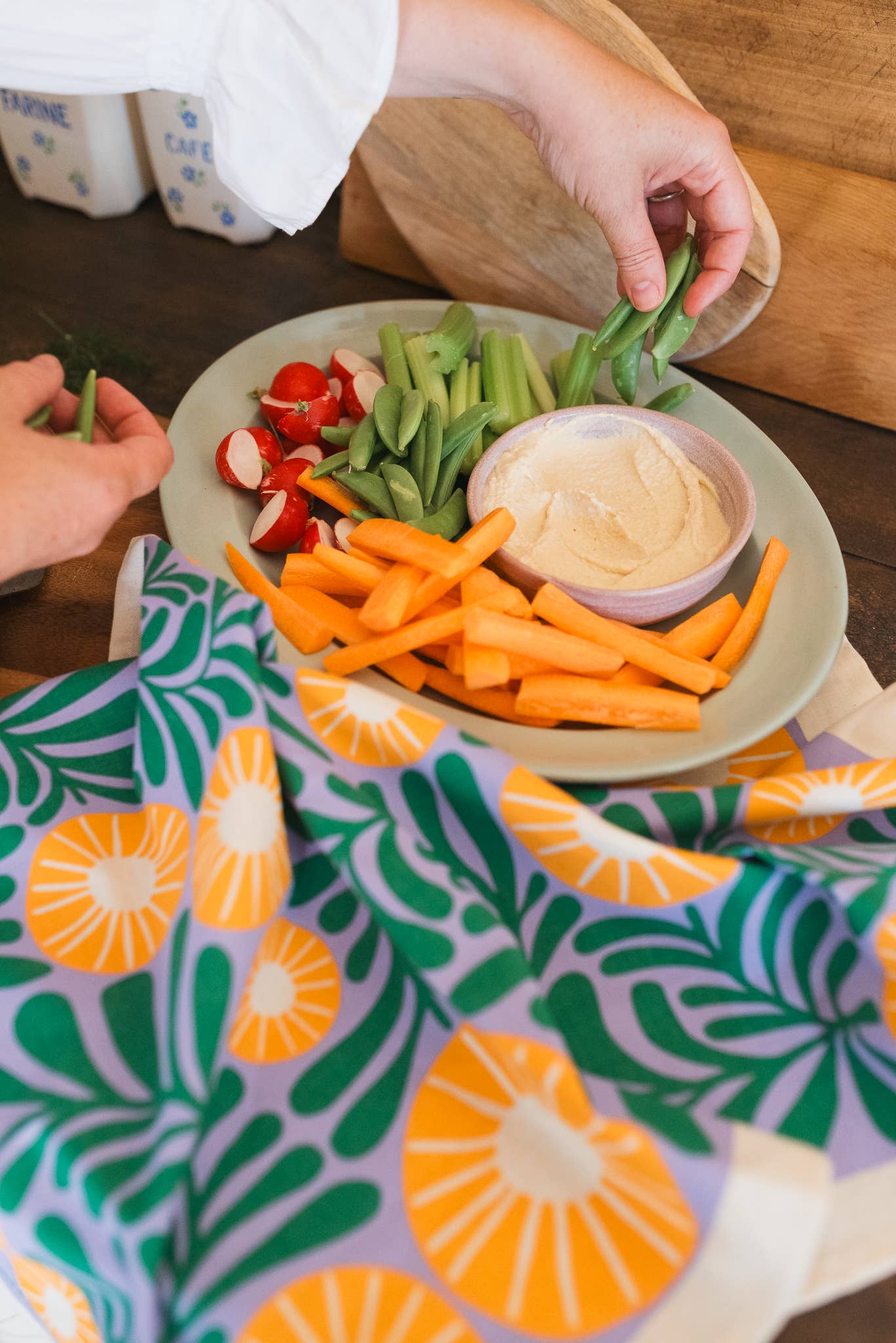 Vine floral design tea towel screenprinted on unbleached natural cotton by Studio Wald, with hanging loop.