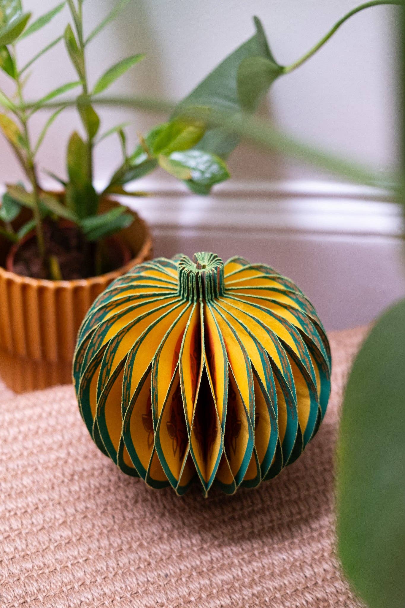 Recycled cotton paper gourd honeycomb decoration with cotton hanging loop, eco-friendly ornament.