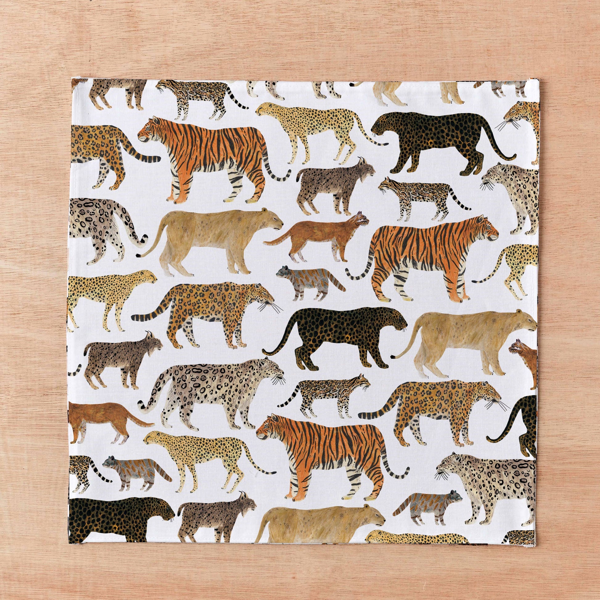 Folded Wild Cats pocket square with recycled kraft paper band