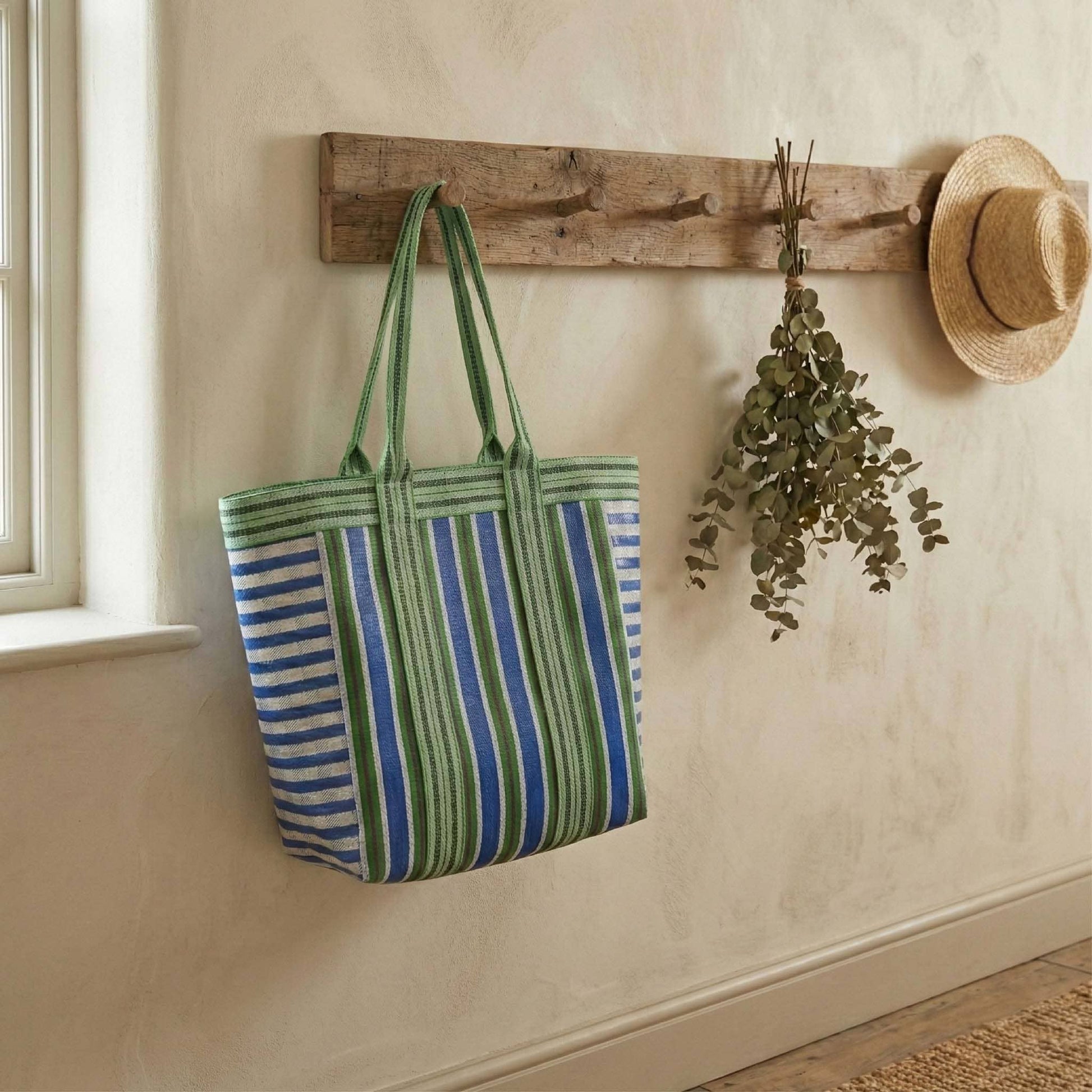 Eco-conscious woven shopping bag folded flat