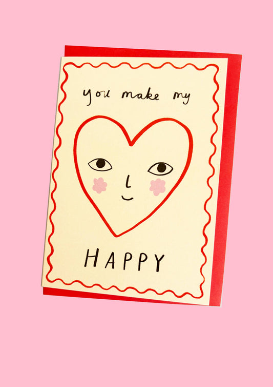 Simple and elegant card perfect for an Anniversary or Valentine's. You Make My Heart Happy, is exclusive art work from Kitty Kenda. Featuring an illustration of a red heart with a face and the words you make my (HEART illustration) Happy.