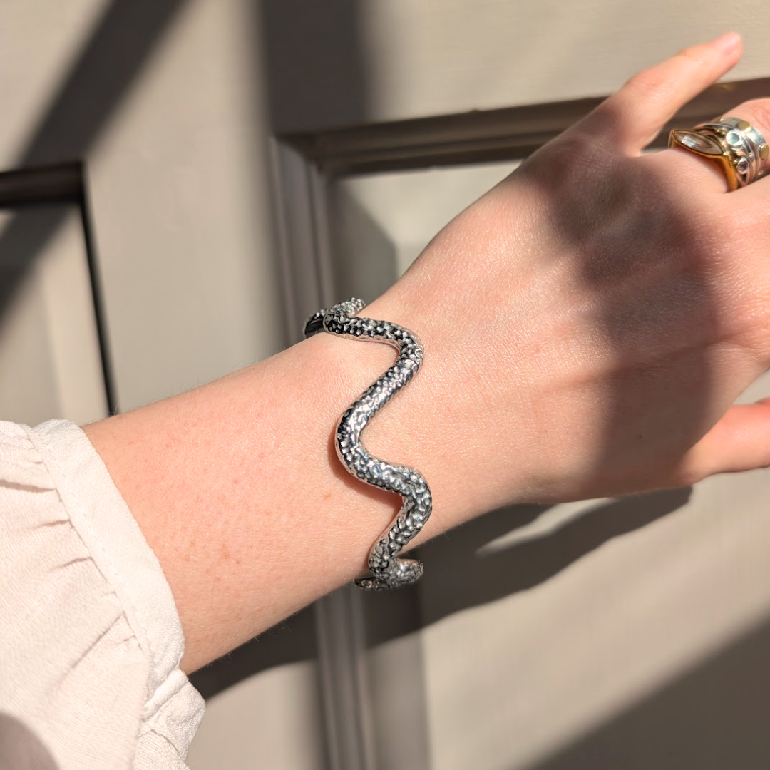 Everyday Silver Dimple Wave Bangle on wrist