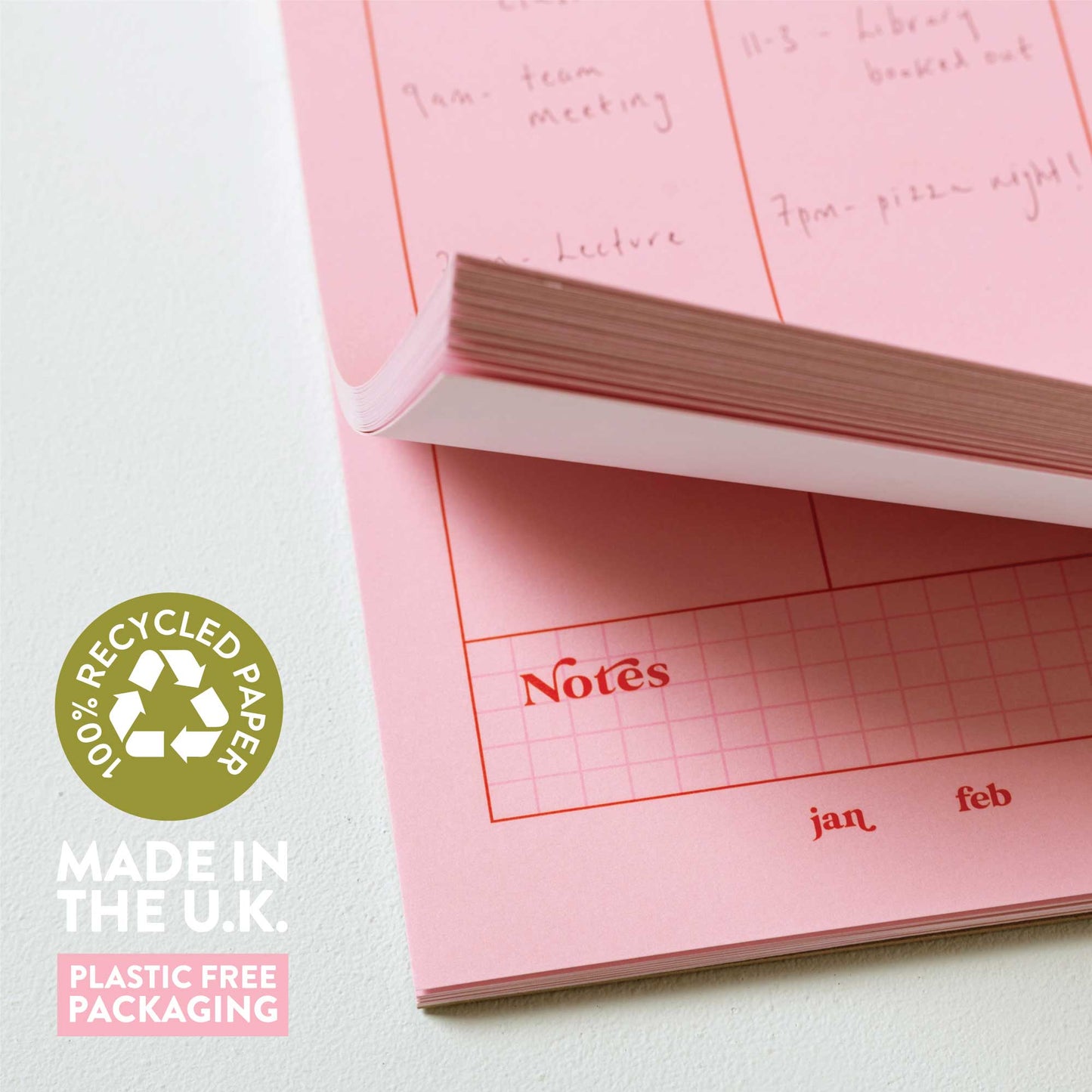 A4 Pink & Red Weekly Planner Pad displayed with its sustainably sourced belly band, highlighting UK design.