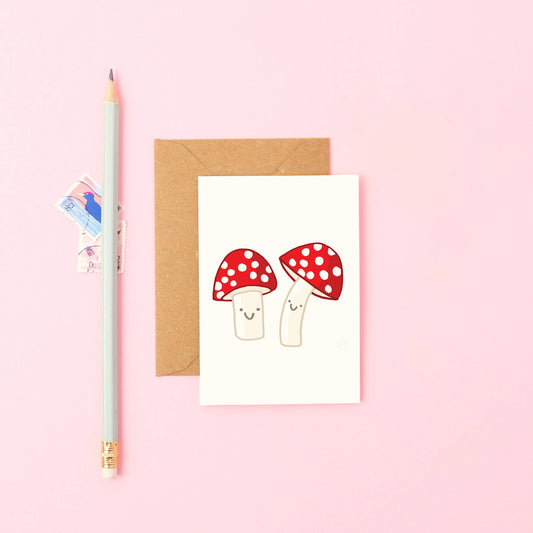 Mini A7 greeting card featuring hand-drawn fly agaric mushrooms