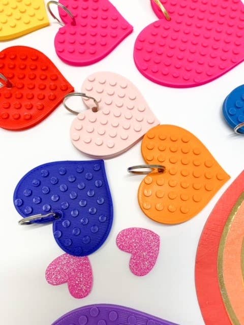 Rainbow assortment of biodegradable heart keyrings – perfect for gifting
