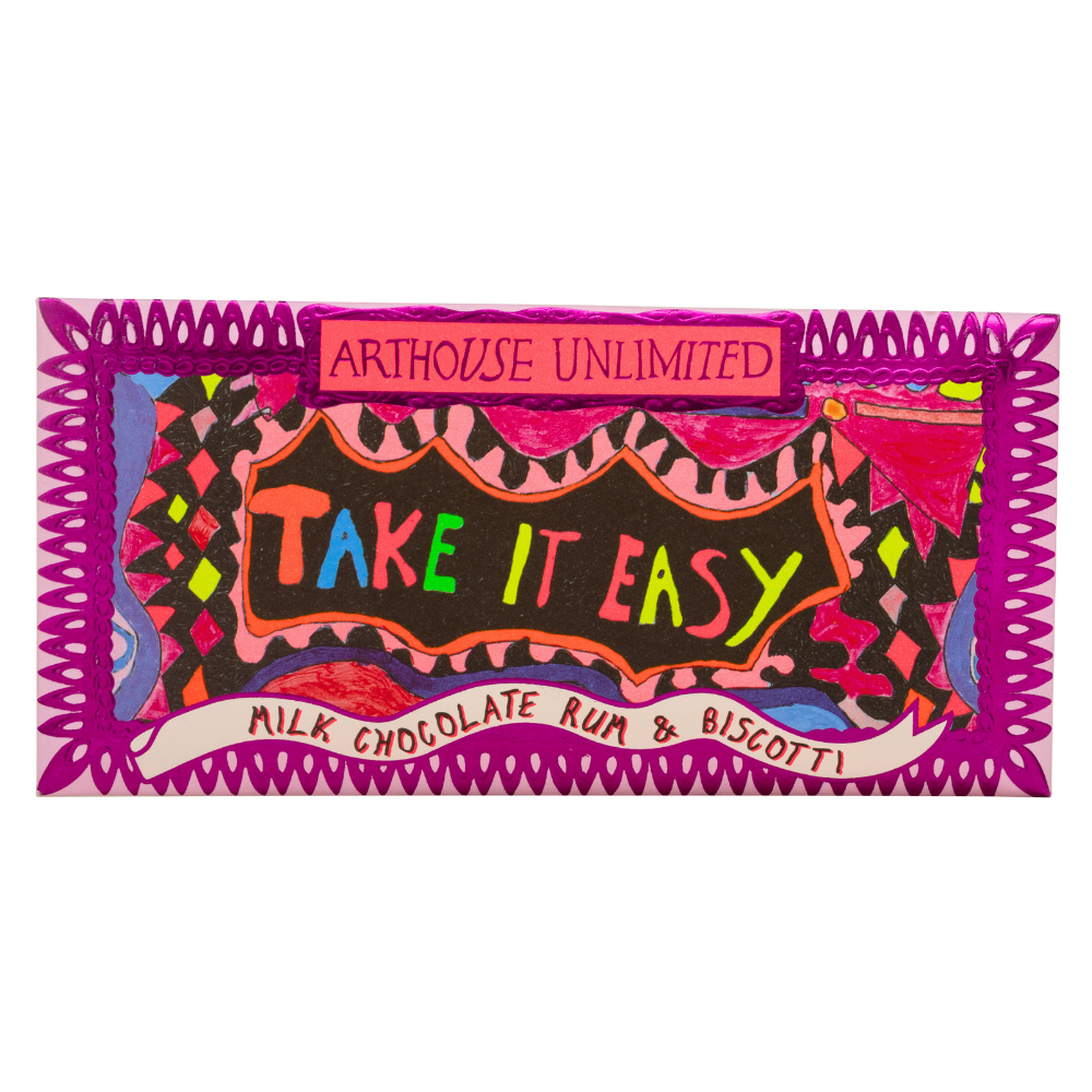 Joy Sized: Take It Easy milk chocolate bar with rum and biscotti flavour, wrapped in recyclable paper with bright artwork by Laura Tregellas.