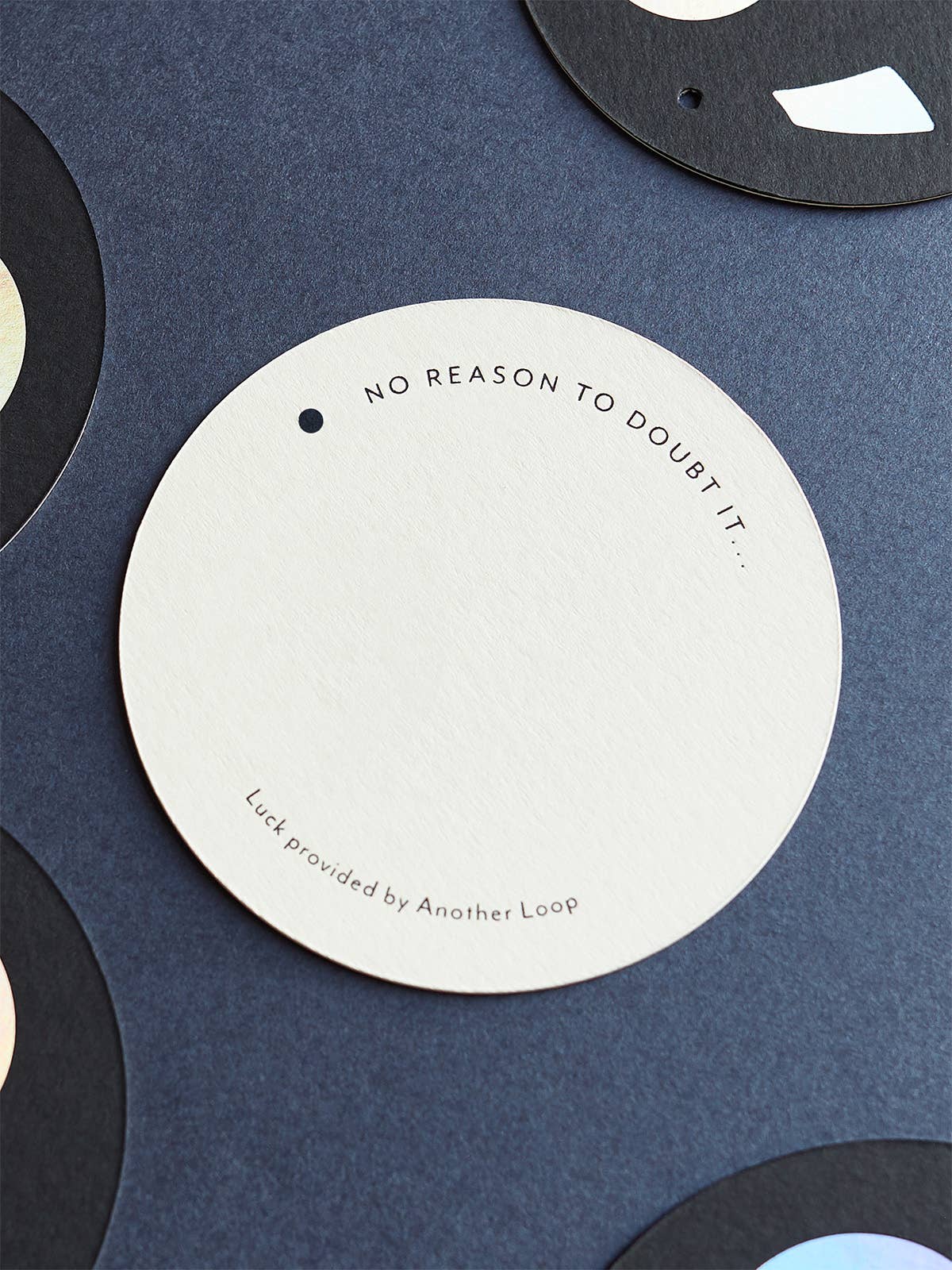 Hand-pressed details of the Lucky 8 Ball Token card