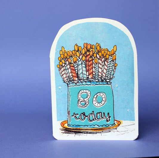 Celebrate eighty years young by blowing out the candles on this blue birthday cake, making a wish and enjoying this whimsical design by Laura Skillbeck! Oval topped card with a pale blue background and the words 80 today.