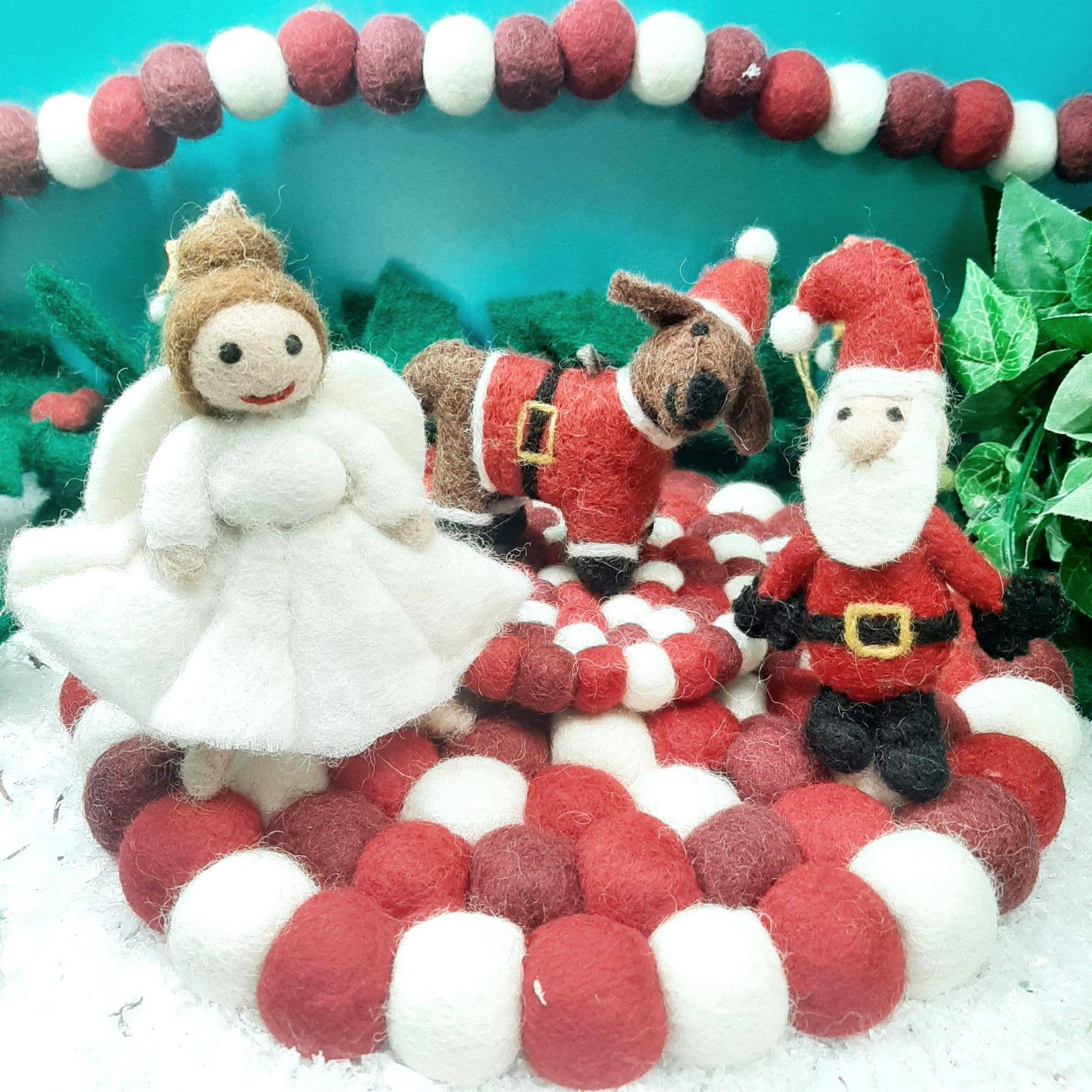 Handmade felt Christmas decoration set featuring mini Santa, Christmas angel, and festive dog, crafted from sustainable wool by Felt So Good.