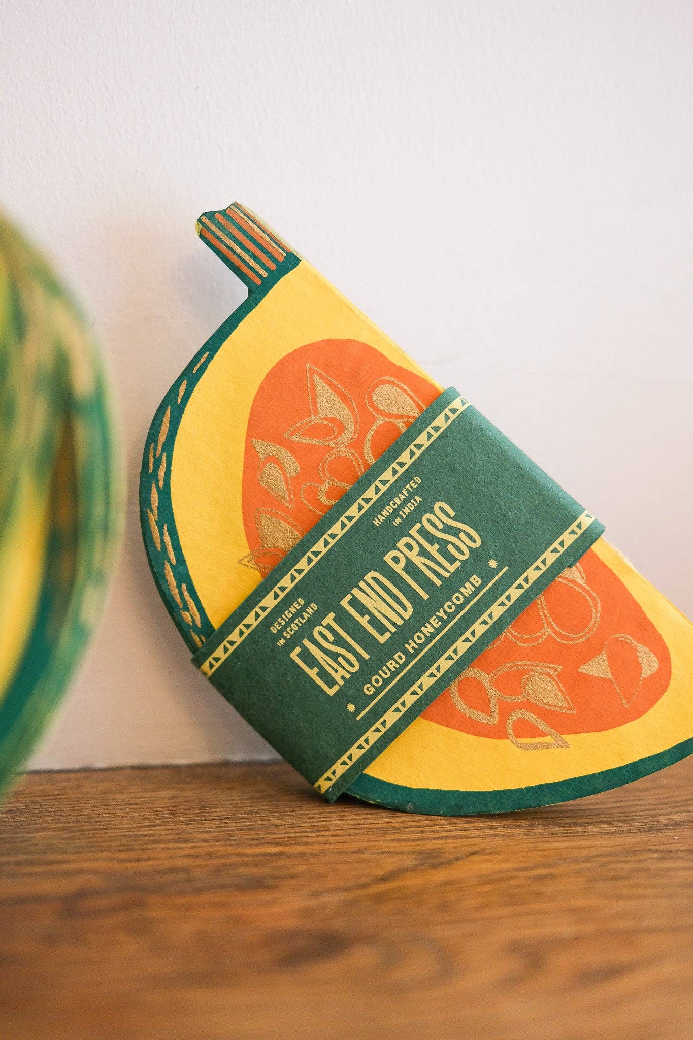 Recycled cotton paper gourd honeycomb decoration with cotton hanging loop, eco-friendly ornament.