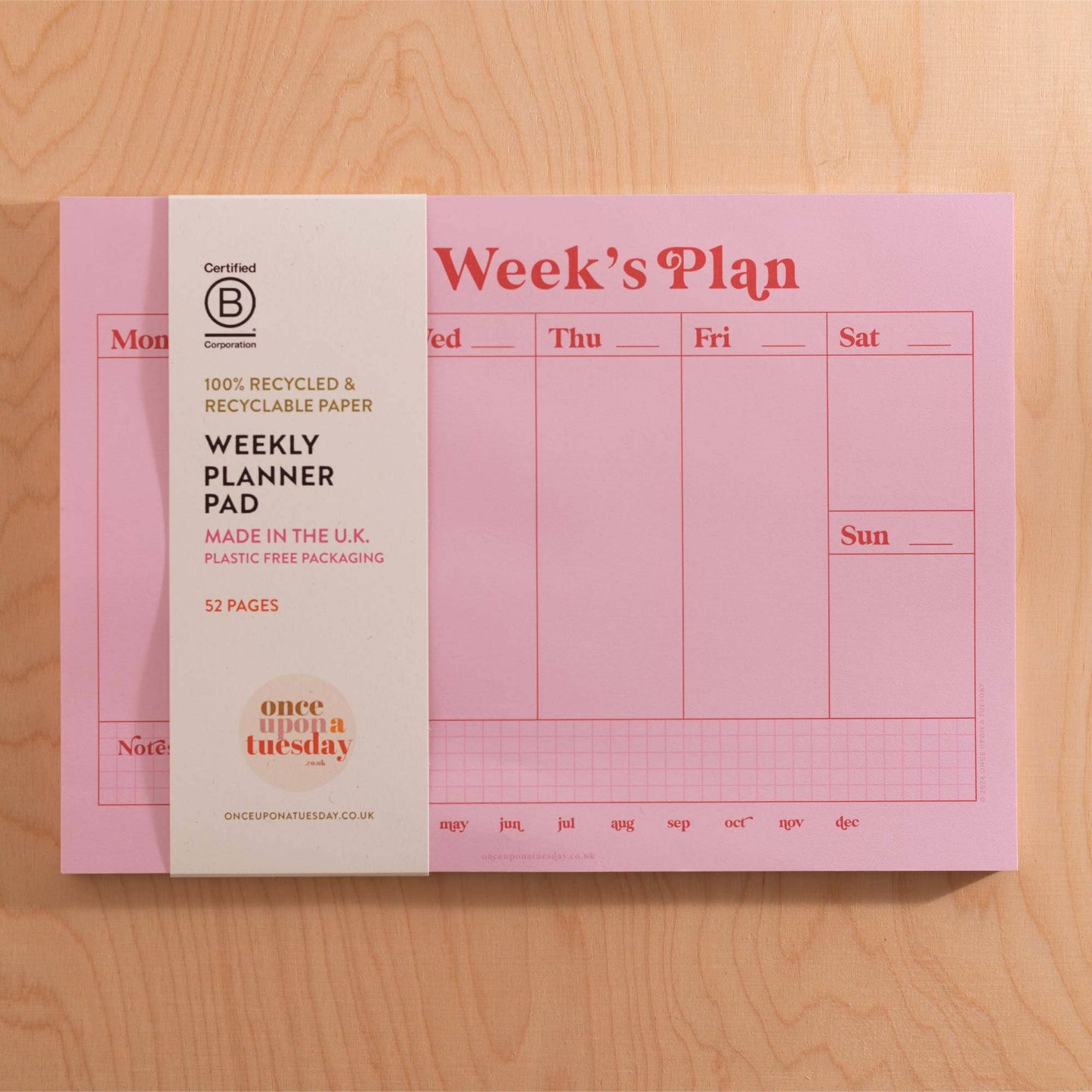Stack of A4 Pink & Red Weekly Planner Pads, showcasing the vibrant colours and neat design.