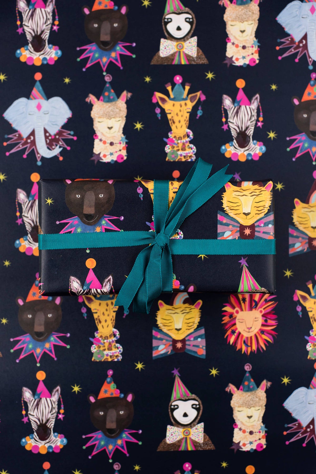 Rolled sheets of eco-friendly magical animal gift wrap