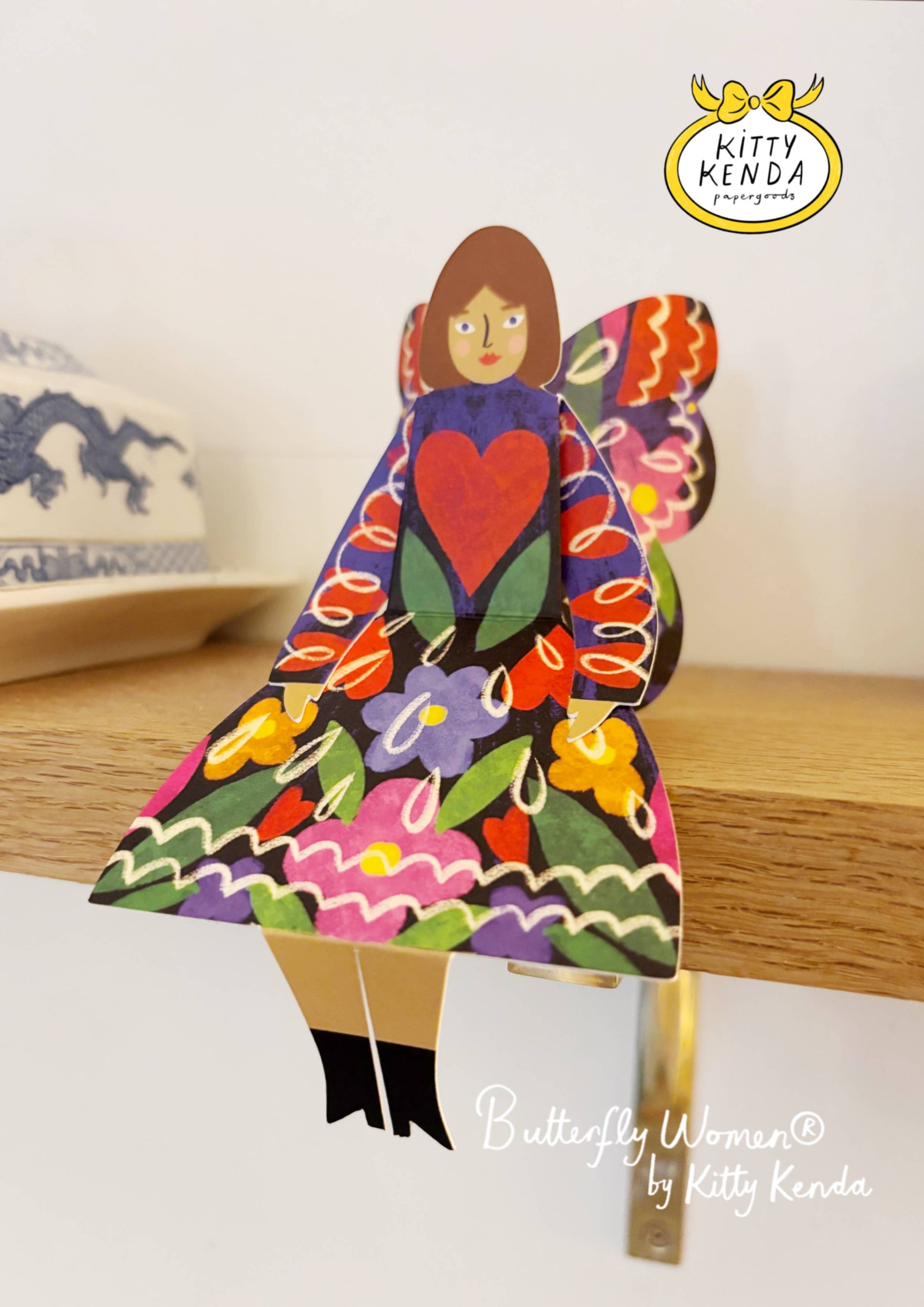 Butterfly Woman Birthday Card, Midnight Floral, folded to sit decoratively on a surface