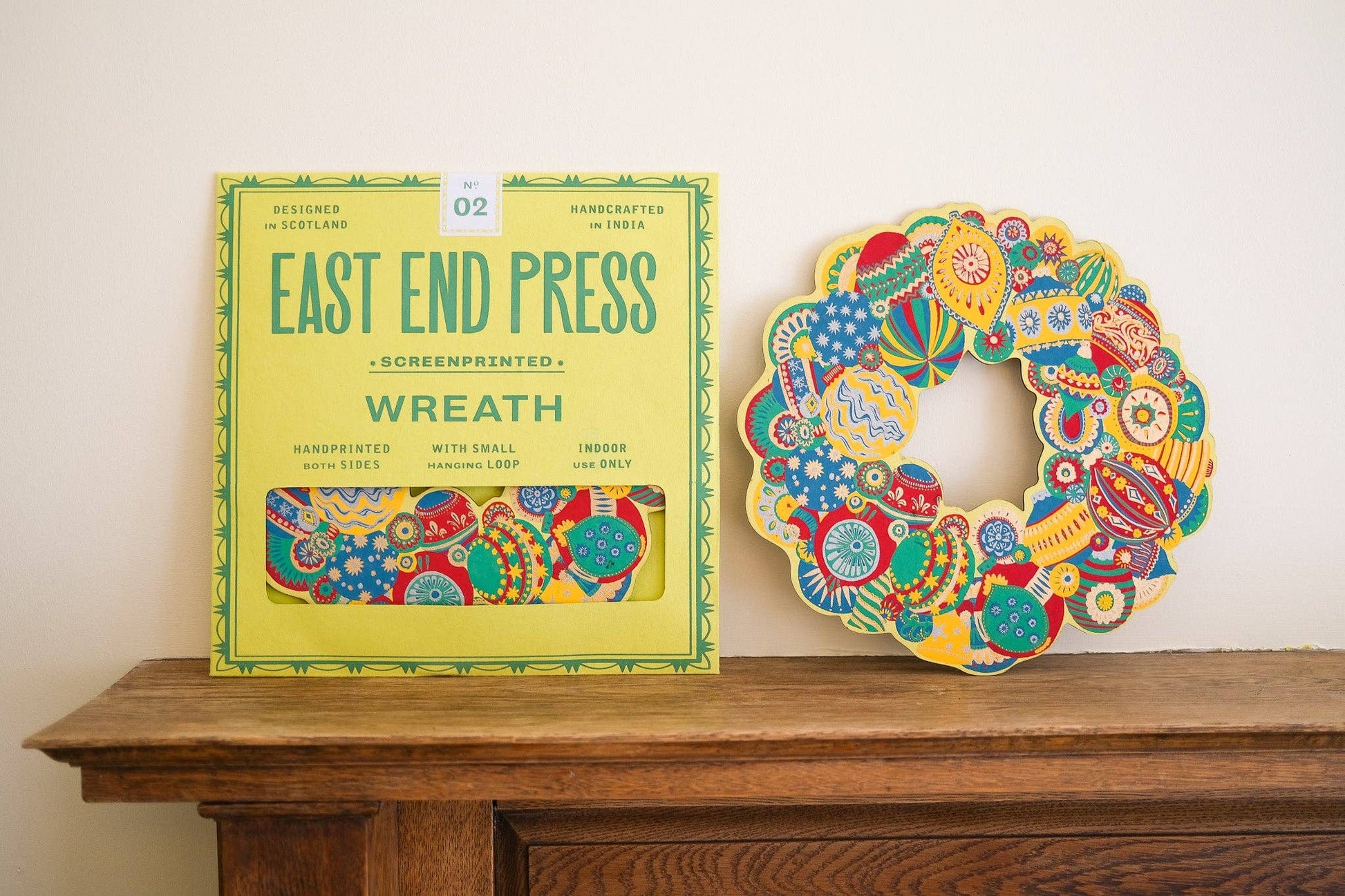 Hand-printed Colourful Bauble Cotton Board Wreath by East End Press with hanging loop, sustainable ornament